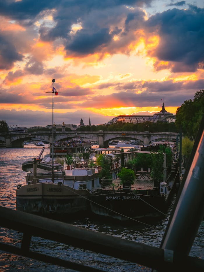 Boats in the Seine River at Sunset